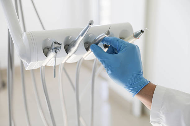 Professional Tooth Extraction technician working in Linden, CA